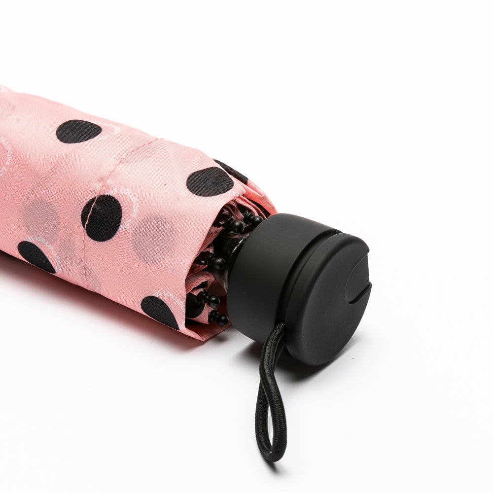 Parapluie à pois rose