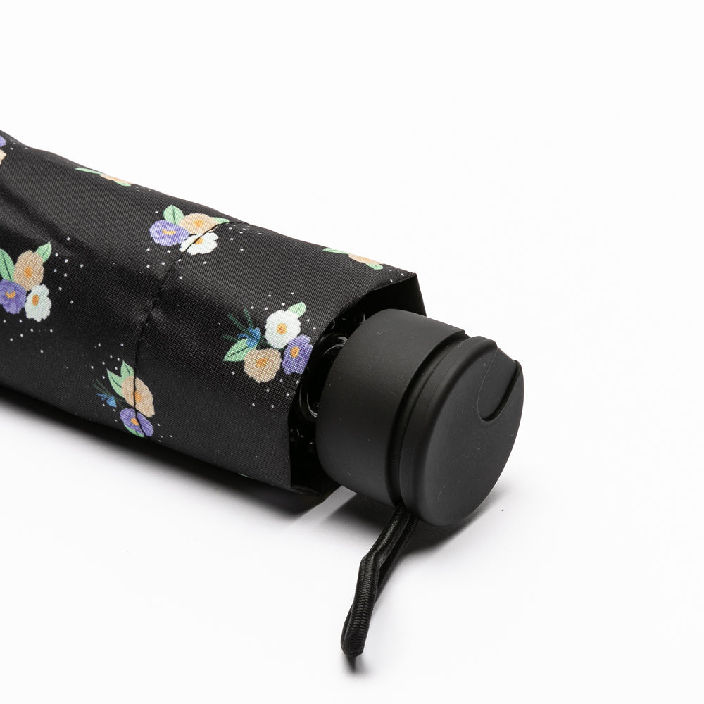 Parapluie pliable noir à imprimé printanier