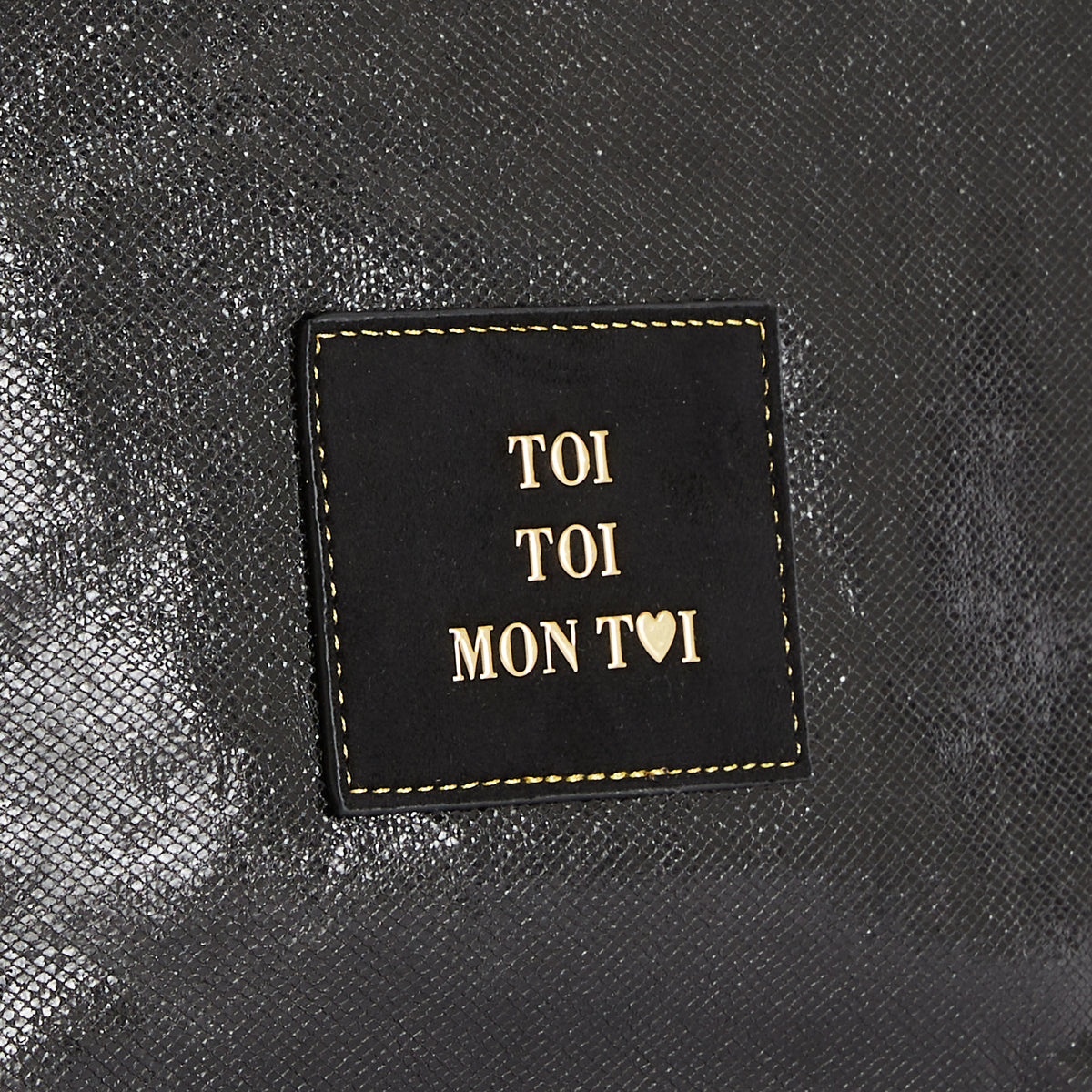 Pochette noire Romane