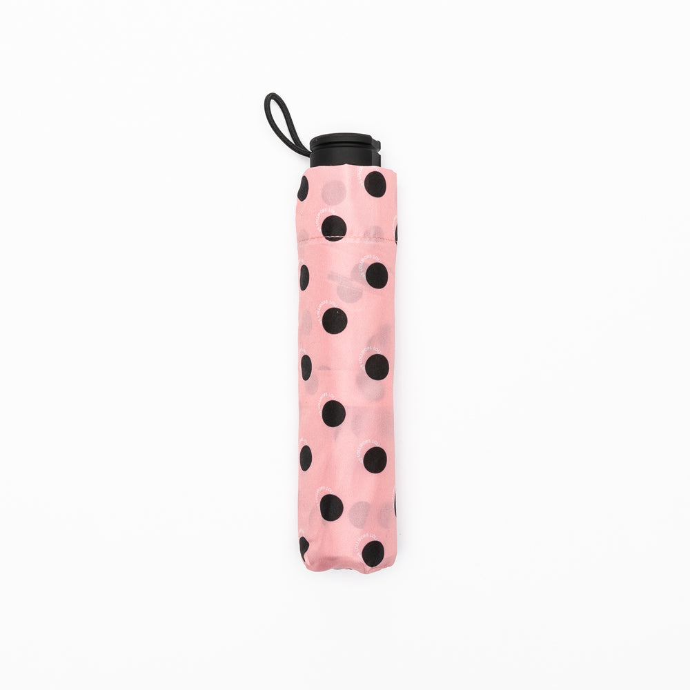 Parapluie à pois rose